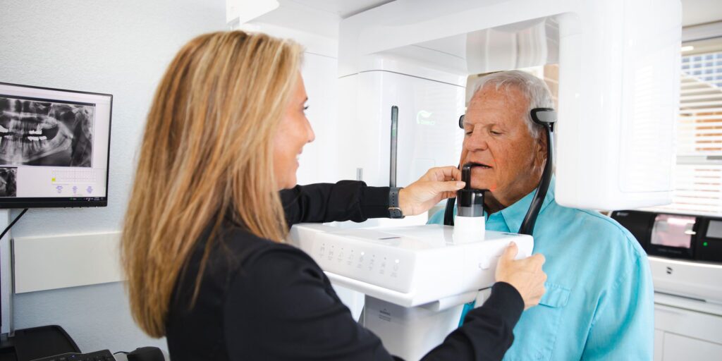 alan with tc receiving cbct scan to see full mouth scan
